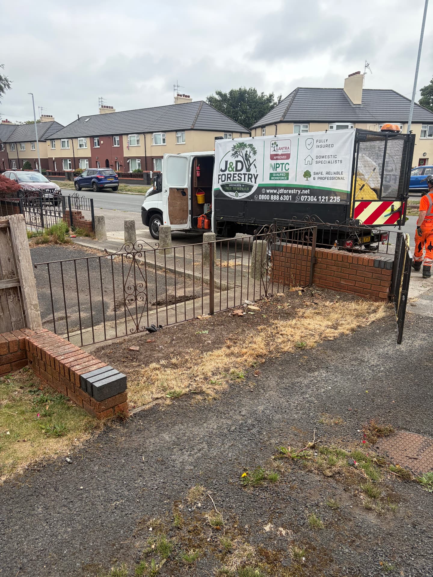 Overgrown front garden shrubs cleared by J&D Forestry — after